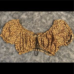 Off shoulder frill trim tie front leopard top